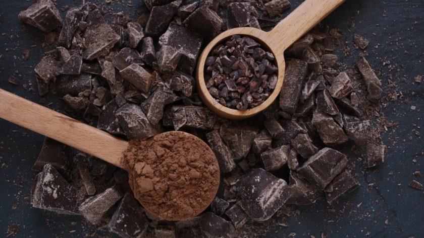Chocolate chopped with cocoa powder and cacao nibs.