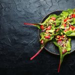 Spring vegetable salad in chard leaves